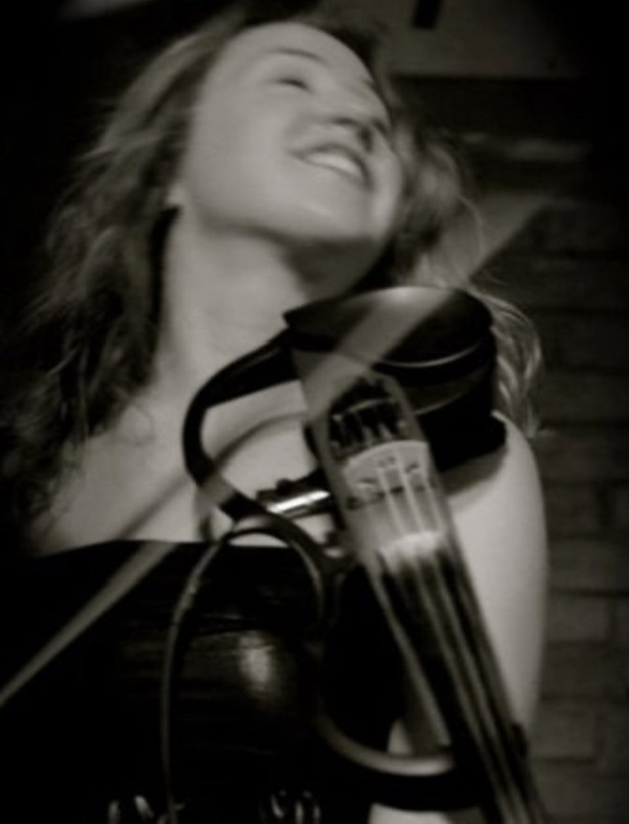 Tamar playing violin
